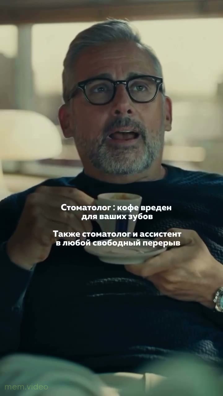Кадр: Мужчины пьют кофе в рекламе Lavazza
