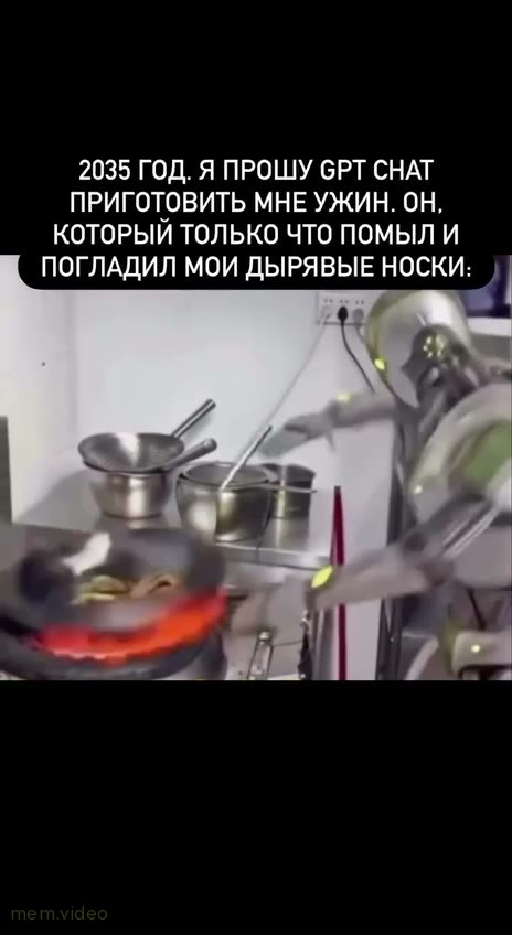 Кадр: Робот-повар готовит еду и стучит ложкой