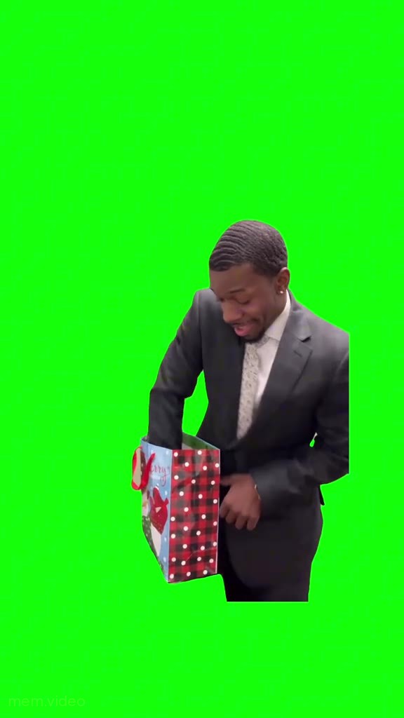 Кадр: "All I want for Christmas" — мужчина швыряет подарок