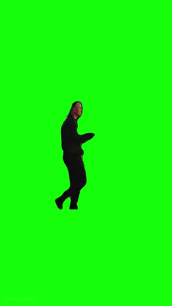 Кадр: Дэниел Крейг танцует на зеленом фоне